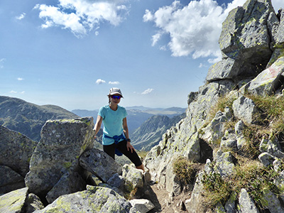 Retezat National Park Posing by the rock.